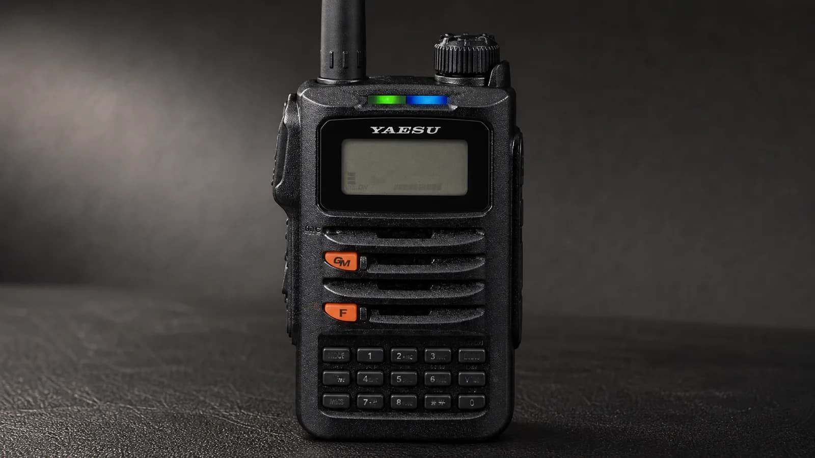Close-up of the Yaesu FT-70DR keypad and LCD display showing channel and frequency information